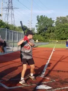 A batter waiting at the plate during an Aurora Turners softball game