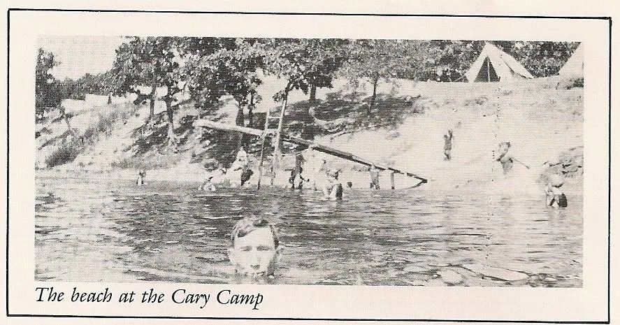 Campers gathered on the beach at the Cary camp